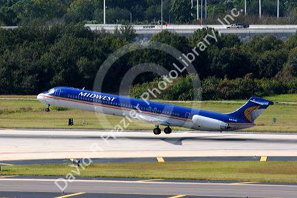 Midwest MD-80 airliner taking off from the Tampa International Airport, Tampa, Florida.