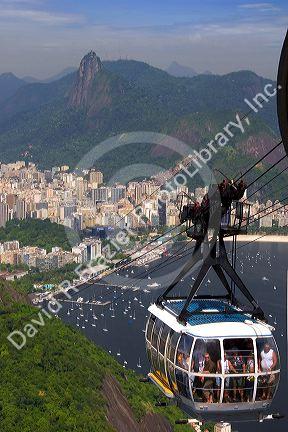View of Rio de Janeiro and cable car on Sugarloaf Peak, Brazil.