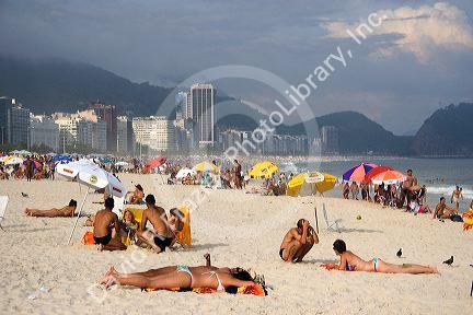 A beach scene at the Copacabana Beach in Rio de Janeiro, Brazil.