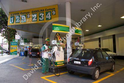 Gas station showing prices for gasoline and alcohol in litres in Sao Paulo, Brazil.