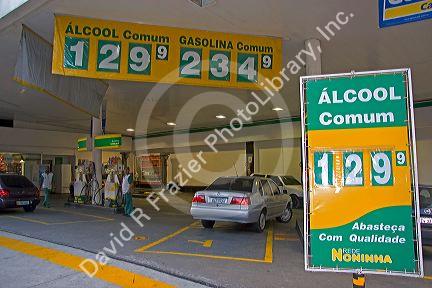 Gas station showing prices for gasoline and alcohol in litres in Sao Paulo, Brazil.