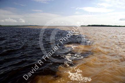 The confluence of the Amazon River and the Rio Negro at Manaus, Brazil.