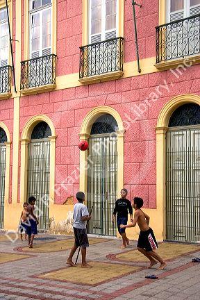 Brazilian boys play a game of street soccer in Manaus, Brazil.