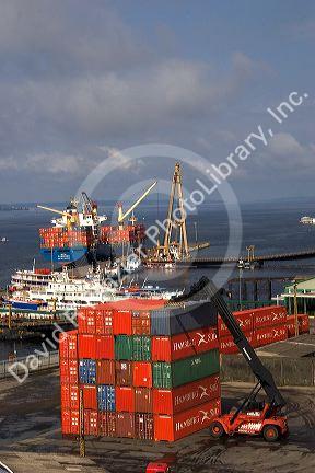 Container ship and containers at the port in Manaus, Brazil.