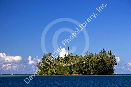 Small island called a motu off the island of Tahiti.
