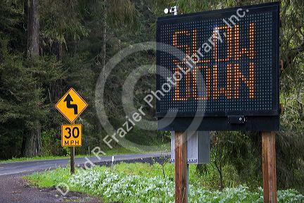 Radar operated digital road sign warning motorists to slow down on U.S. 101 north of Eureka, California.