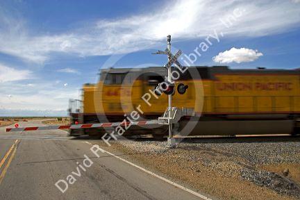 Union Pacific locomotive at a railroad crossing near Mountain Home, Idaho.