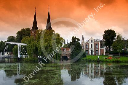 The Eastern Gate and centre along a canal in the city of Delft in the province of South Holland, Netherlands.