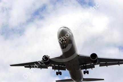 The underside of a Boeing 737 airplane in flight.