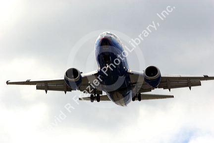 The underside of a Boeing 737 airplane in flight.