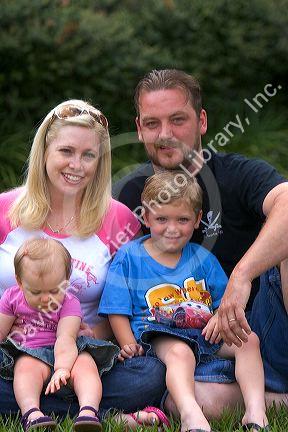 Family portrait with mother, father, son, and daughter in Florida. MR