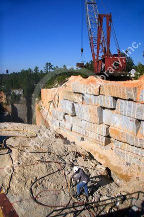 Worker drilling in a granite quarry in Elberton, Georgia.