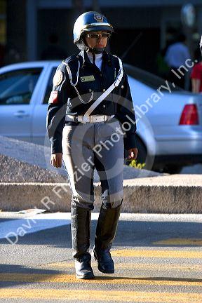Female police officer on the street in Mexico City, Mexico.