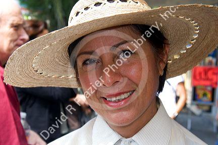 Mexican woman wearing a hat in Mexico City, Mexico.