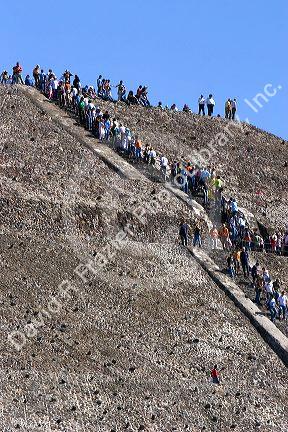 Tourists climb the steps of the Pyramid of the Sun at Teotihuacan in the State of Mexico, Mexico.