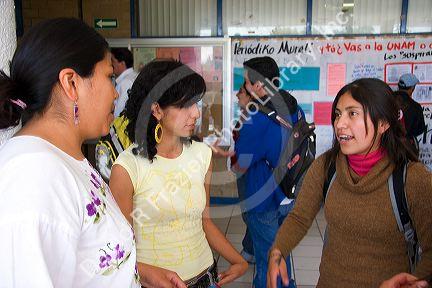 Mexican female students socialize on the campus of the National Autonomous University of Mexico in Mexico City, Mexico.