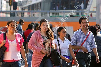 Young adults at Insurgentes Plaza in Mexico City, Mexico.