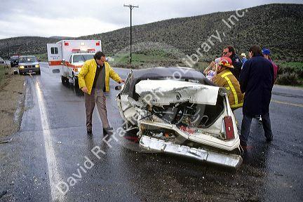 Paramedics at the scene of an automobile accident.