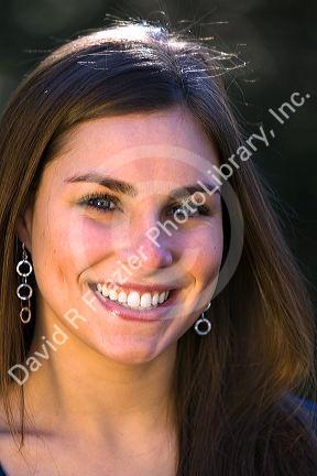 Portrait of a young woman smiling. MR