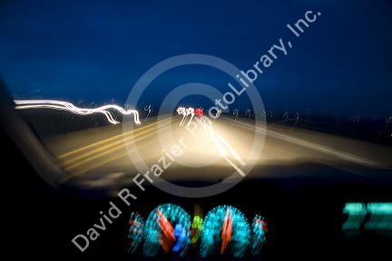 Dashboard lights while driving at night.