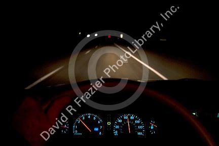Dashboard lights while driving at night.