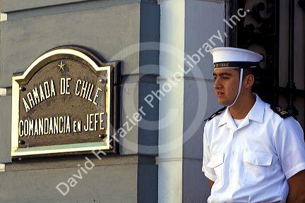 Sailor on guard at the entrance to the Chile Navy headquarters in Valparaiso, Chile.