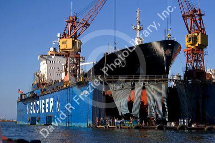 Floating dry dock with container ship in the Port at Valparaiso, Chile.