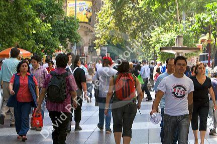 People walk on the Paseo Ahumada in Santiago, Chile.