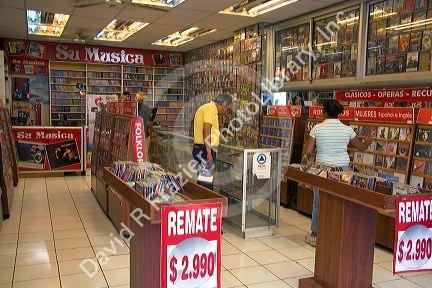 People shop in a music store in Santiago, Chile.