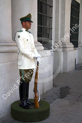A guard outside the Palacio de la Moneda in Santiago, Chile.