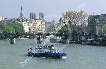 Tour boat on the River Seine in Paris, France.