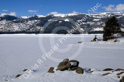 Cascade Lake covered in ice and snow in Cascade, Idaho.