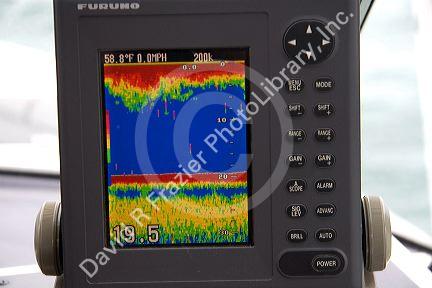 The screen of a fishfinder using sonar to measure water depth and detect fish in Lake Erie, Michigan.
