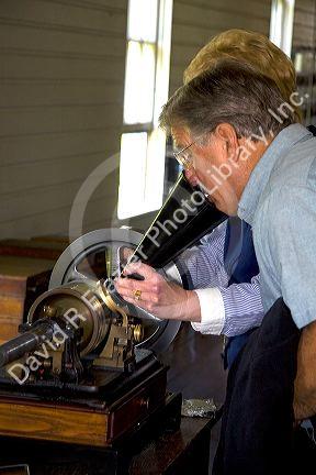 Edison cylinder phonograph in the Thomas Edison Menlo Park laboratory in Greenfield Village at The Henry Ford in Dearborn, Michigan.