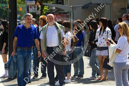 Street scene with diverse population in Vancouver, British Columbia, Canada.