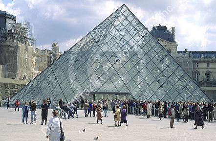 Glass pyramid at the entrance to the Lourve in Paris, France.
