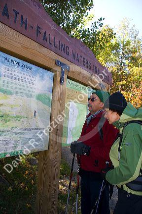 Hikers at the Bridle Path-Falling Waters Trail Head at Mount Lafayette of the Franconia Range in the White Mountain National Forest, New Hampshire, USA.