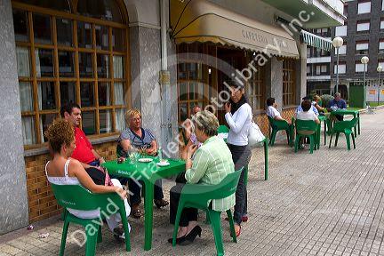 People dine outdoors at a cafe in Guernica in the province of Biscay, Basque Country, Northern Spain.