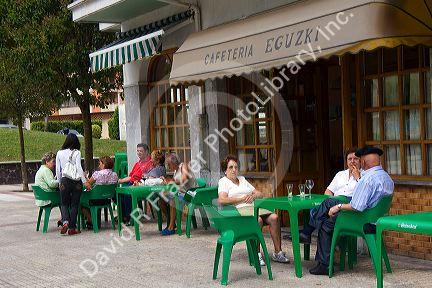 People dine outdoors at a cafe in Guernica in the province of Biscay, Basque Country, Northern Spain.