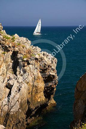 Sailboat in the harbor at Castro Urdiales, Cantabria, northern Spain.