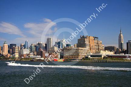 Pleasure boat on the Hudson River and New York City, New York, USA.