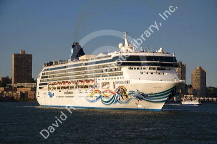 Norwegian Spirit cruise ship departing New York City on the Hudson River, New York, USA.