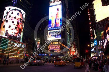 Times Square at night in Manhattan, New York City, New York, USA.