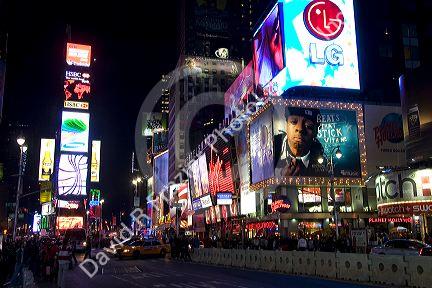 Times Square at night in Manhattan, New York City, New York, USA.