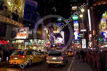 Times Square at night in Manhattan, New York City, New York, USA.
