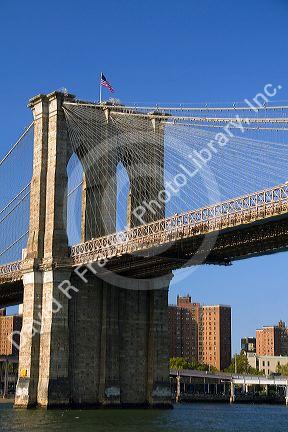 The Brooklyn Bridge spanning the East River in New York City, New York, USA.