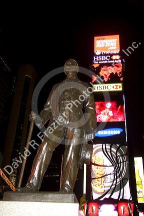George M. Cohan Statue in Time Square at night, Manhattan, New York City, New York, USA.