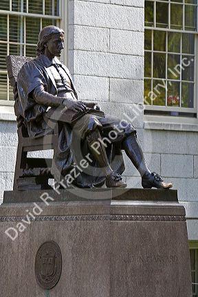 John Harvard statue in Harvard Yard at Harvard University in Cambridge, Greater Boston, Massachusetts, USA.
