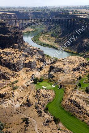 Aerial view of Blue Lakes Country Club golf course and the Perrine Bridge in the Snake River Canyon at Twin Falls, Idaho, USA.
