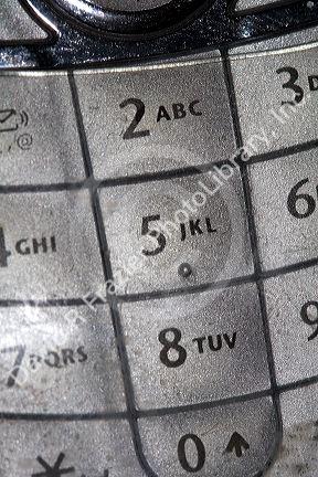 The number pad of a cell phone.